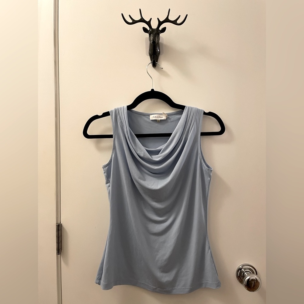 Draped light blue top